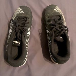 Black and white Size 7 Nike softball cleats. Brand new. Worn two times.